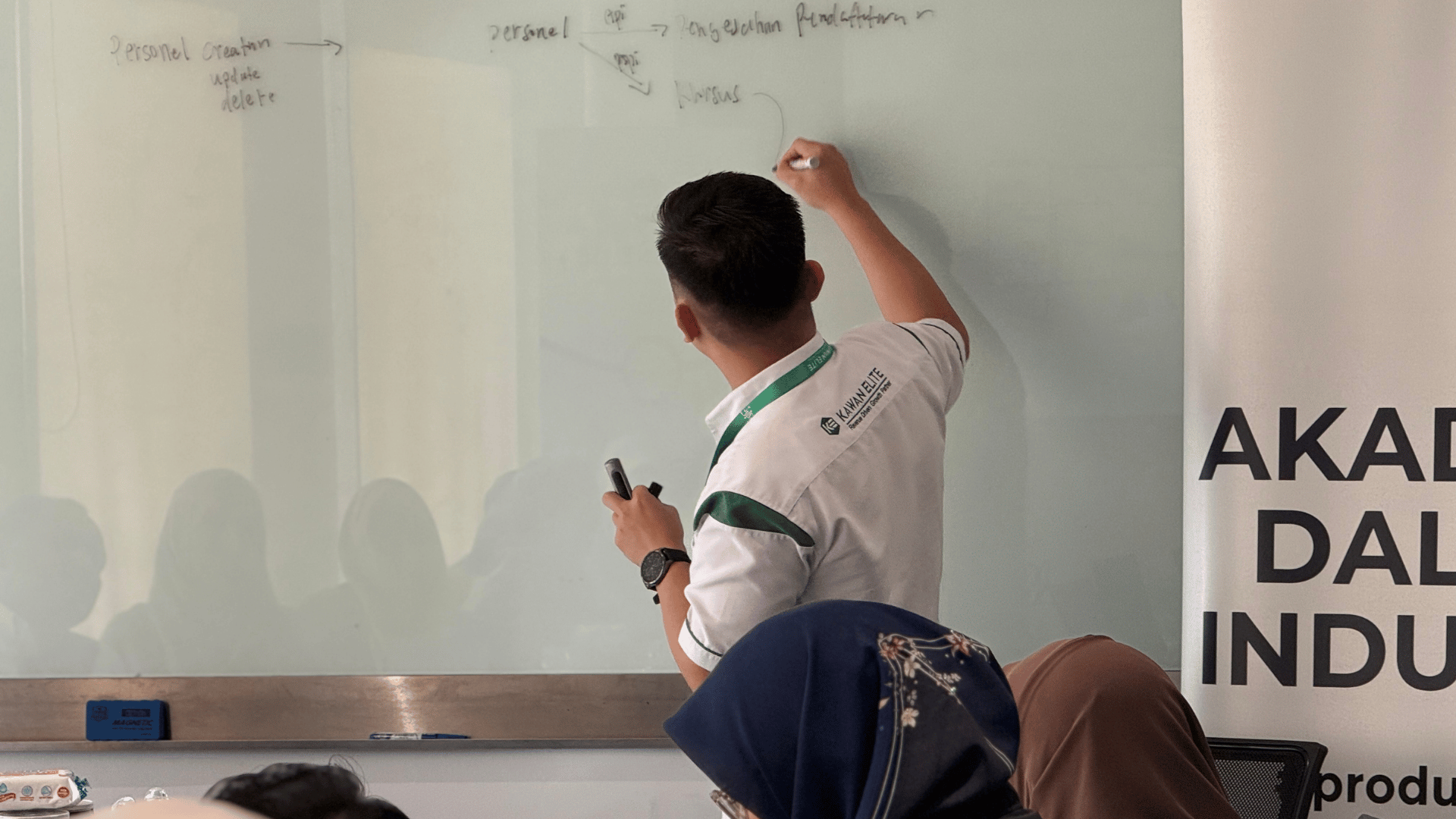 Kawan Elite explaining the platform workflow during the training session, supporting knowledge transfer and practical understanding among participants.